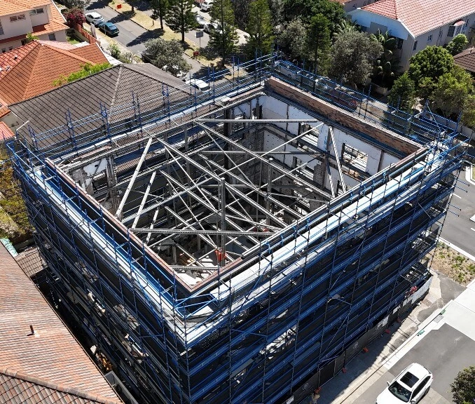 Coates preserves heritage-listed facade during 4-storey demolition