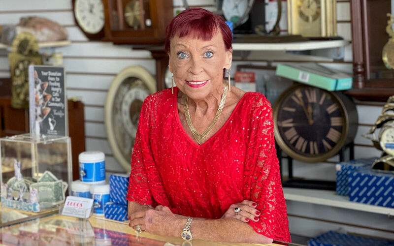 Jojo Boggs stands behind the counter of her family's jewelry store in Sun City Center, Fla.