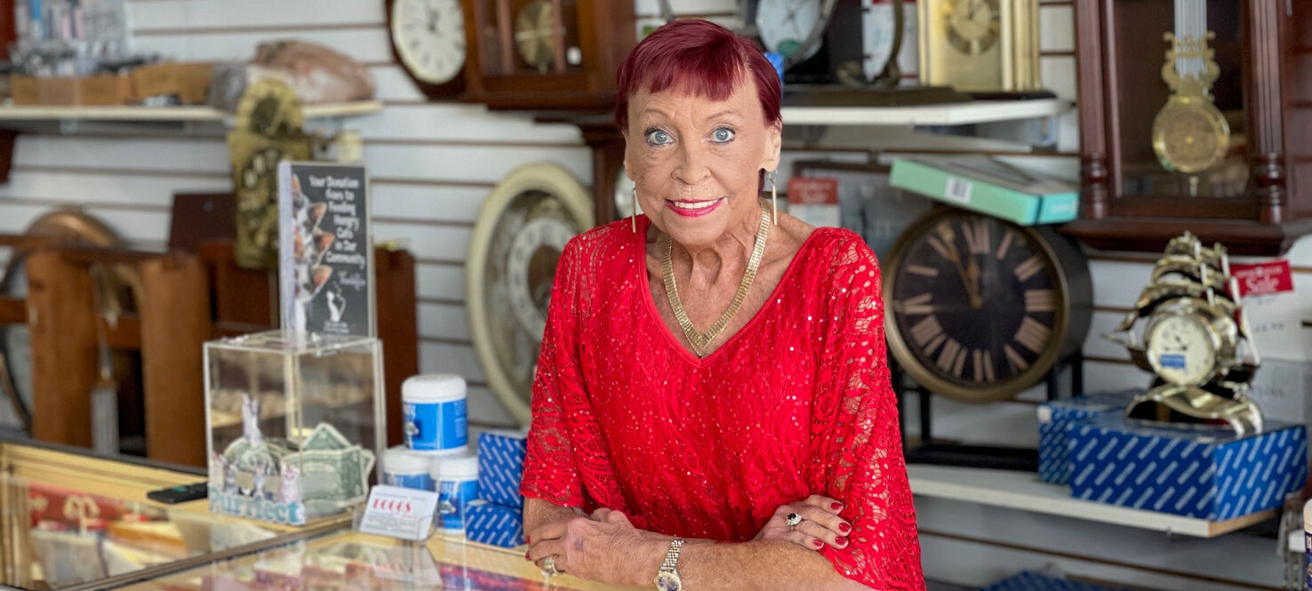 Jojo Boggs stands behind the counter of her family's jewelry store in Sun City Center, Fla.