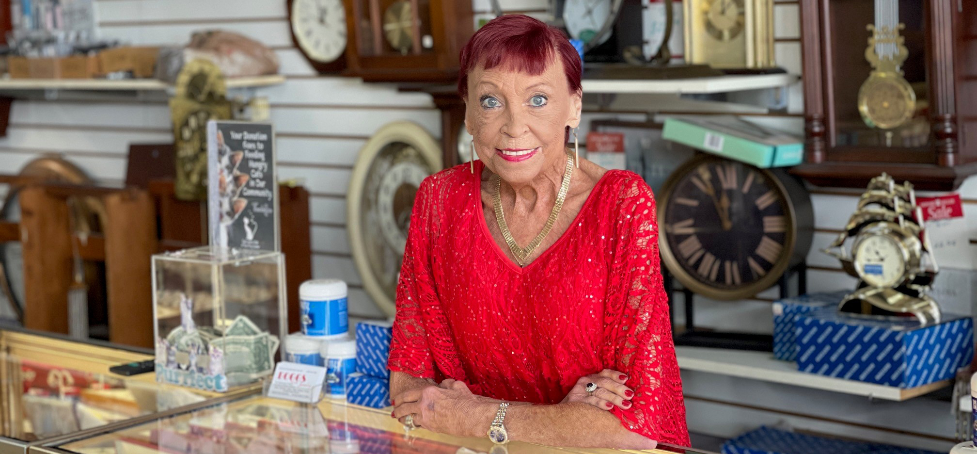 Jojo Boggs stands behind the counter of her family's jewelry store in Sun City Center, Fla.