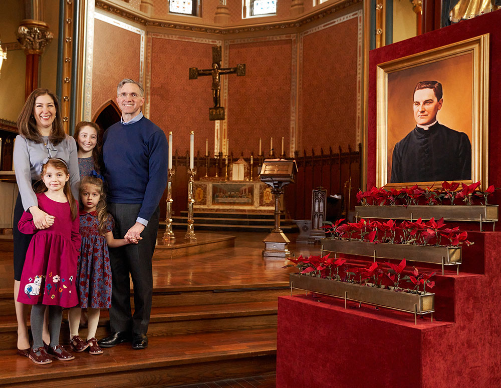 Supreme Knight Kelly and his wife, Vanessa, stand together with their three daughters in St. Mary&rsquo;s Church in New Haven, Conn., where Blessed Michael McGivney founded the Knights of Columbus in 1882.
