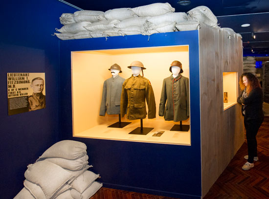 Three World War I united states war uniforms placed in an exhibit