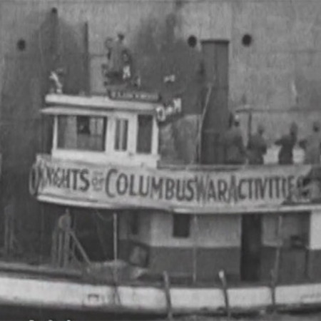 A Knights of Columbus tugboat providing war relief activites during ww1.