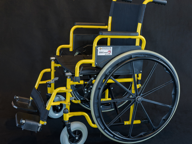 Yellow and black wheelchair provided as part of the Knights of Columbus Global Wheelchair Mission, in partnership with the American Wheelchair Mission