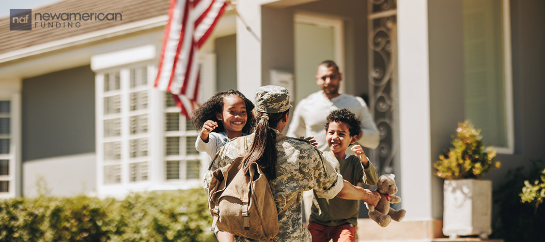 female military woman in uniform hugging her children