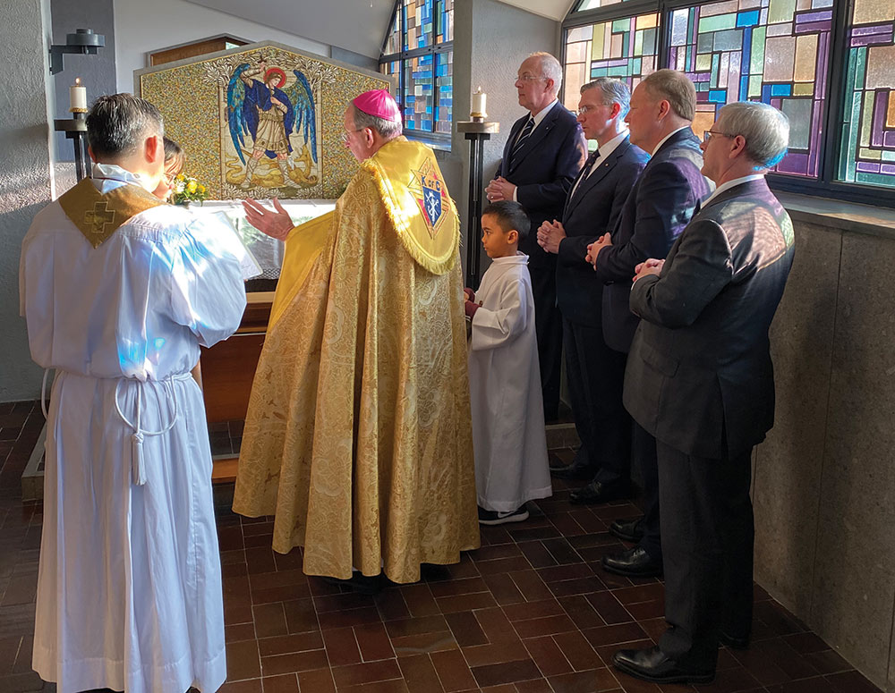 Archbishop Lori blesses a new mosaic of St. Michael the Archangel Feb. 9 in the chapel at Campo Sportivo Pio XI, one of the Order&rsquo;s sports centers in Rome.