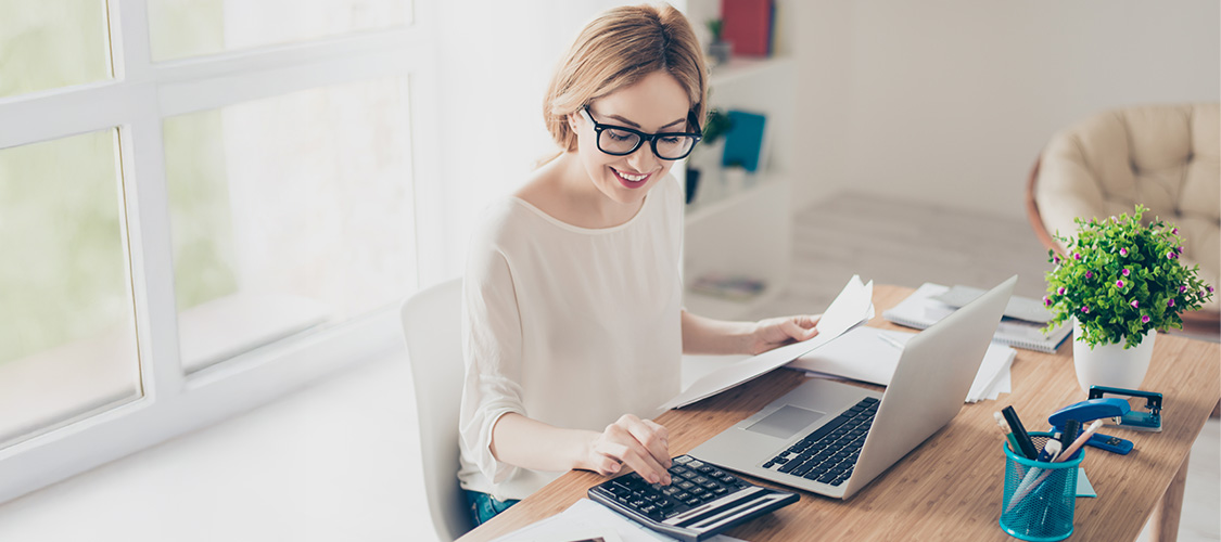 Woman working at a computer