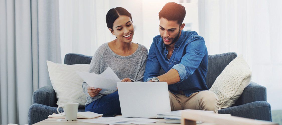 A young couple discussing their finances