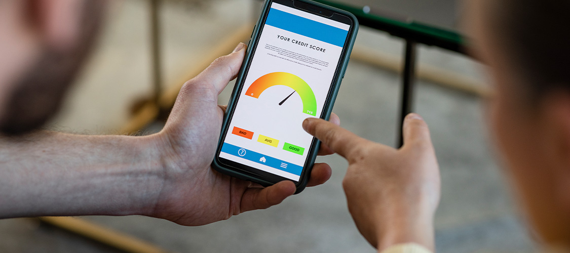 A person reviewing their credit score