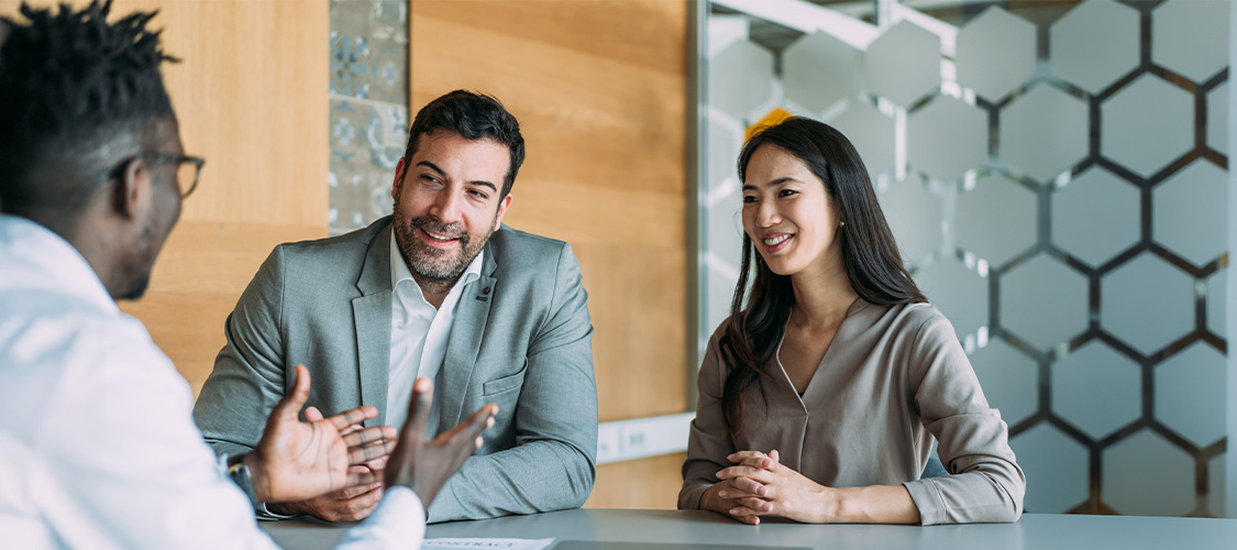 Homebuyers talking to a Loan Officer