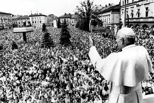 Pope John Paul II waves to a huge crowd of faithful in Wadowice