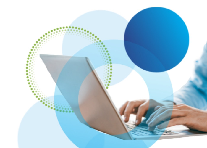 Hands typing on laptop, decorative circles overlaid