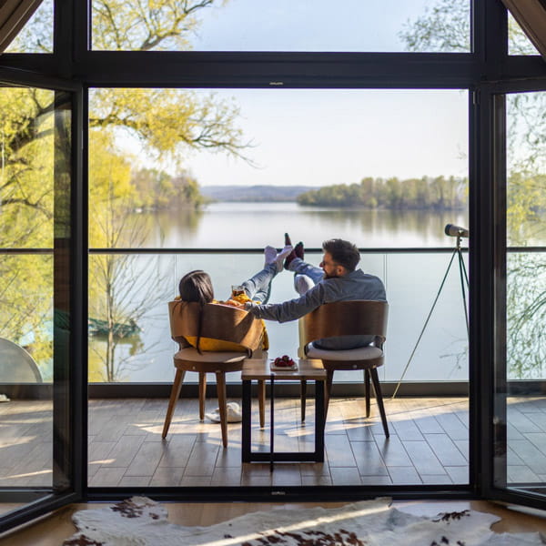 couple on the deck lakeside
