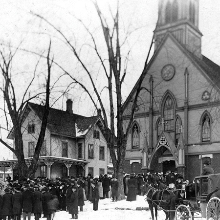 Parishioners gather outside the old St. Thomas Church in Thomaston in 1884, the year that Father McGivney was assigned to the parish.