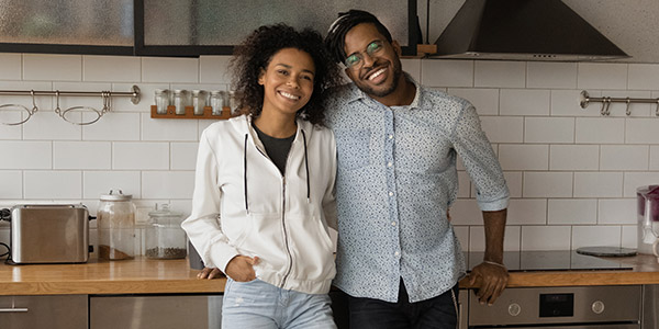 young couple in their kitchen