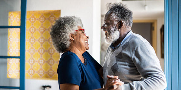 laughing seniors dancing