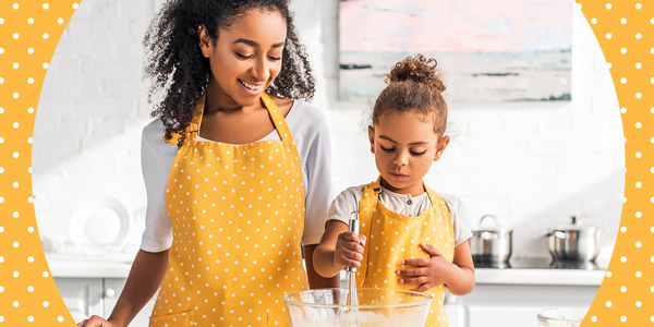 mother and daugther cooking together