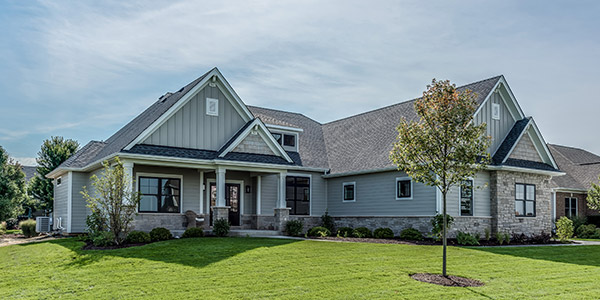 A nice house with grey vinyl siding 