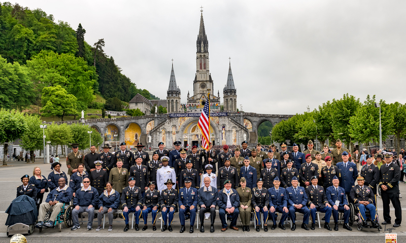 The US Military pose for a photo at the 2019 Lourdes Pilgrimage. 