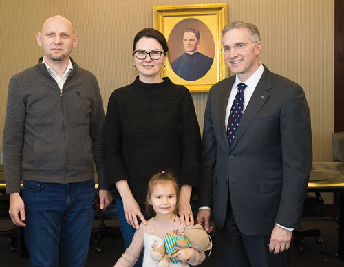Olga and Roman Panivnyk visit Supreme Knight Patrick Kelly at the Supreme Council headquarters in New Haven, Conn., with their youngest daughter