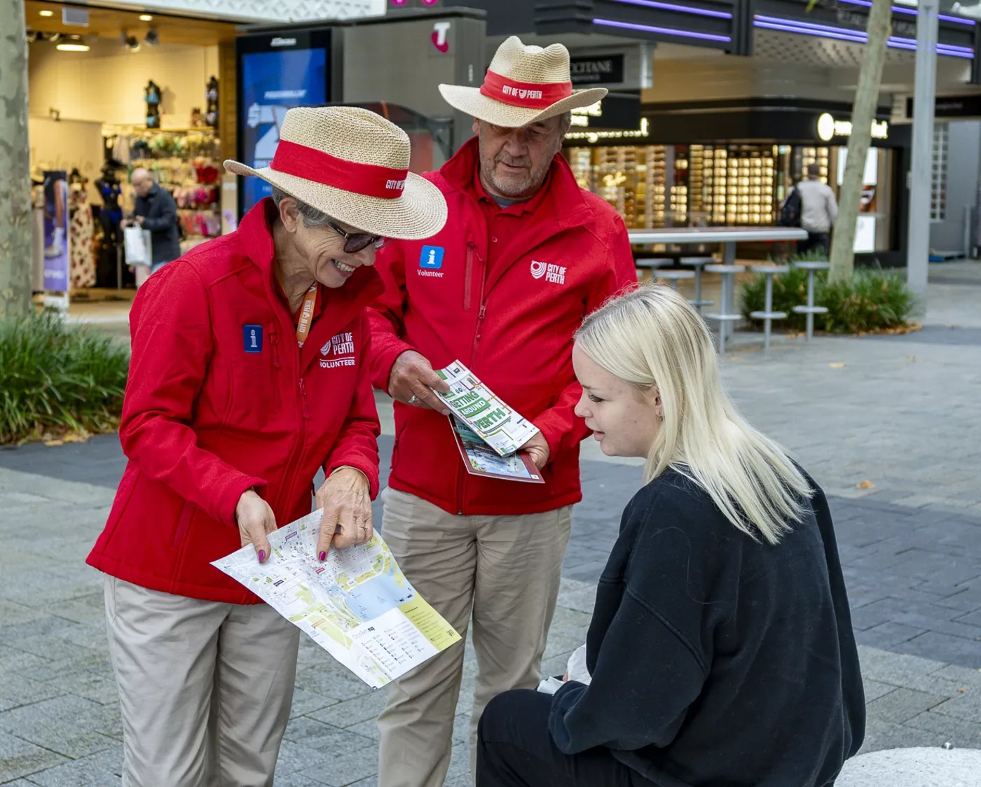 iCity Kiosk volunteers assisting a member of the public